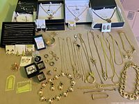 Overview of all jewelry items laid out on table