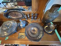 Group view of entire lot on dresser showing main pieces