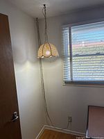 Lamp hanging in corner to show overall size and length of chain