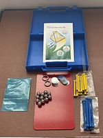 Full kit in open blue case with components laid out