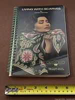 Front cover with ruler indicating size