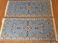 Both wool area mats full view