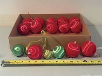 All 17 satin ornaments, mix of red, green, turquoise, gold