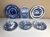 Front view all six blue and white ceramic items