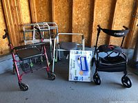Group shot of all mobility aids, commode, boxed bedrail