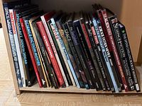 Full shelf view of roughly two dozen science fiction and horror reference books