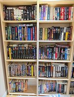 Full view of two bookcases filled with science fiction and fantasy books