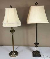 Both pedestal table lamps with shades displayed side by side