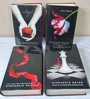 Front covers of all four Twilight Saga hardcovers