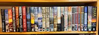 Full shelf view showing all 28 hardcover novels