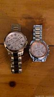Both wristwatches side by side
