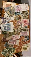 Overview of entire spread of assorted Eastern European banknotes