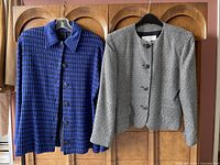 Both Jones New York Petite jackets hanging side by side showing front view, patterns, buttons, collars