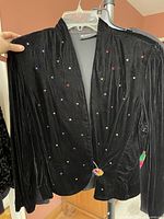 Black velour cardigan with rhinestones on hanger