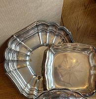 Round scalloped silver-plated tray and square bowl showing overall design and size