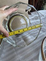 Top view of faceted octagonal bowl with tape measure across