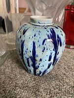 Light blue splatter ceramic vase front view