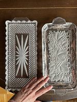 Both trays side by side showing designs and scale