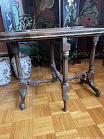 Side profile of table showing gate leg construction, spindle legs and cross stretcher