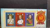 Front view of St Helena “The Napoleons” souvenir sheet showing three mint stamps (30p, 25p, £1) on presentation card