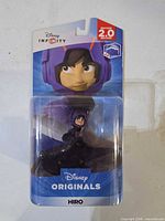 Front view of sealed Disney Infinity Hiro figure in blister packaging