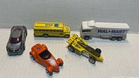 Group shot of five toy vehicles