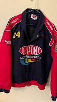Front view of jacket showing colors, DuPont logo, number 24, sleeve patch