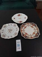 Three serving plates laid out on table