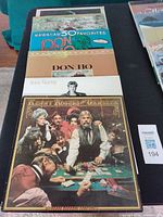 Stack of LP records showing Kenny Rogers, Anne Murray, Don Ho, others