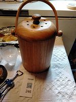 All items together: bamboo compost bin, corkscrew, two pie plates