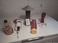 Group shot of all feeders and nectar bottles