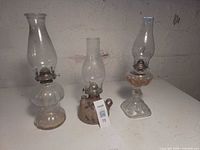 All three coal oil lamps side by side