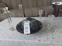 Fountain with four candlesticks on table