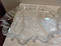 Divided oval platter showing winter scene detail