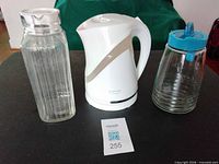 Group shot of electric kettle and two glass pitchers