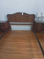 Headboard, frame, both nightstands and one lamp in situ