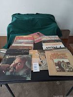 Front view showing multiple album covers including Kenny Rogers and John Denver