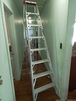 Full view of 8-foot aluminum step ladder opened