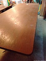 Top view of plywood table showing surface wear