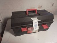 Closed Jobmate toolbox with red handle and latches