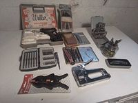 Overview showing all small tools: soldering kit, bit sets, clamps, staple gun, gauges, punch set