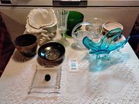 Group view of all ten assorted vases and containers