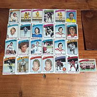 Straight-on shot of all 25 cards laid out in five rows on table