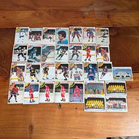 Front view of 31 1978-79 O-Pee-Chee hockey cards arranged on table