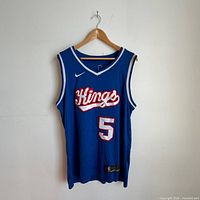 Front view of blue Sacramento Kings De'Aaron Fox jersey