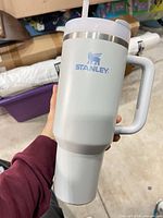 Front view showing Stanley logo, handle, lid and straw