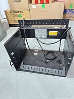 Overall view of rack chassis with PDU and power cord