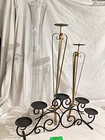 front view of vase, candelabra, and candlesticks