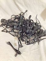 Pile of multiple short black SATA power cables