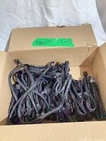 Full box of black sleeved PCIe cables